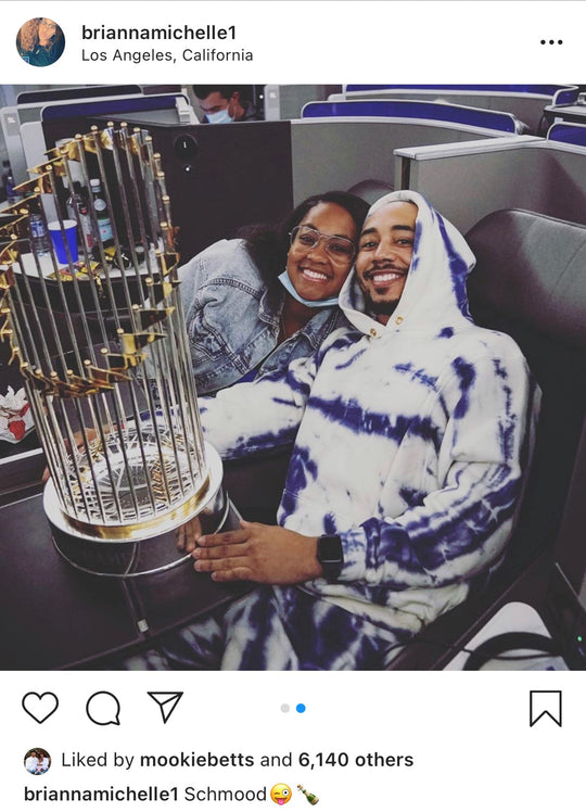 Mookie Betts wears tie dye sweatsuit by Les Tien in IG post holding MLB Commissioner's trophy