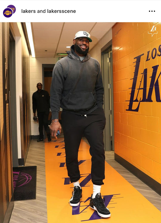 Lebron James on the Lakers instagram wearing at the game a Les Tien Hoodie and Sweats
