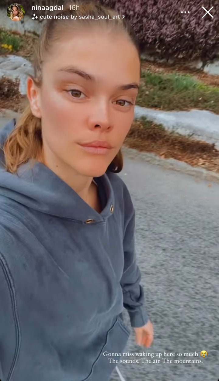 Nina Agdal hoodie sweatshirt in IG post with gold eyelets