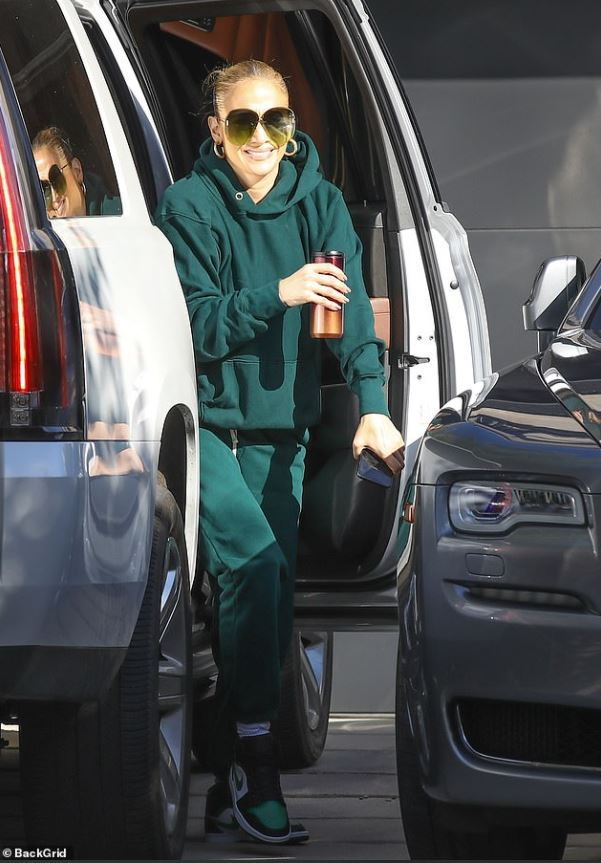 J-Lo wearing sweatpants and sweatshirt by Les Tien